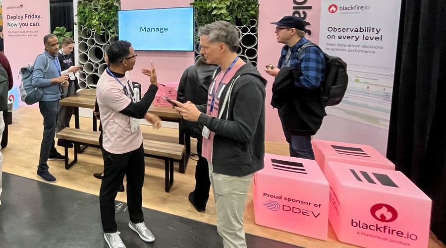 Platform.sh Booth With "Proud Sponsor of DDEV" block